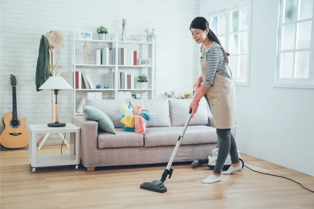 how do you prevent back pain when vacuuming?